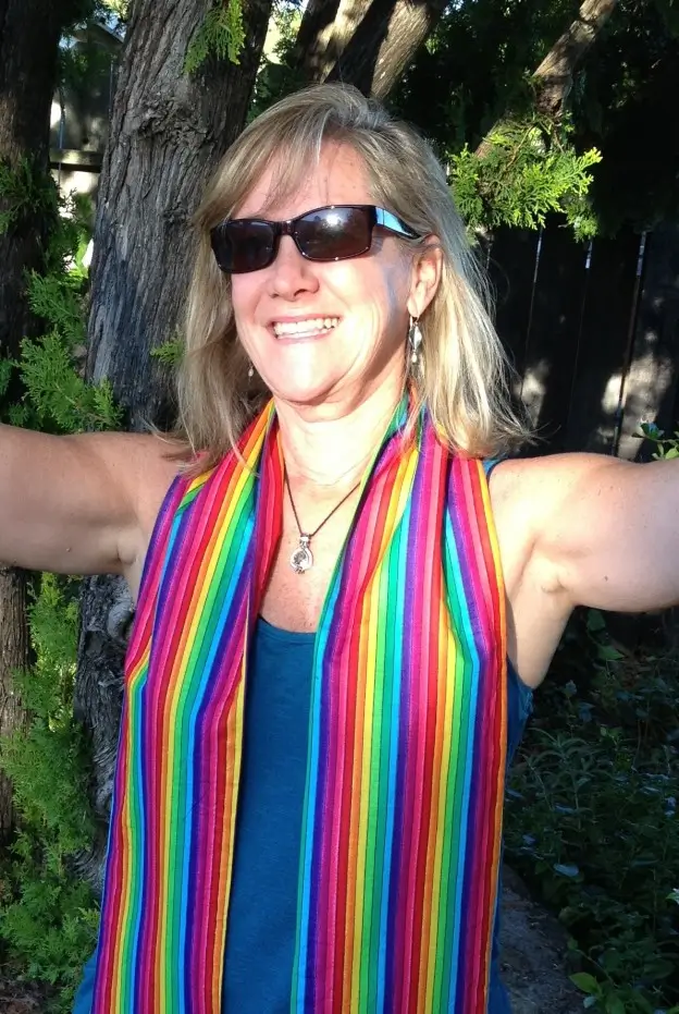 Reverend Kate Chipman officiating an outdoor wedding ceremony.